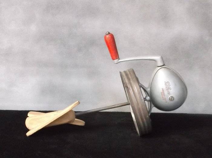 A VERY OLD BUTTER CHURNER MECHANISM IN GREAT CONDITION ...NEEDS THE BOTTLE !!