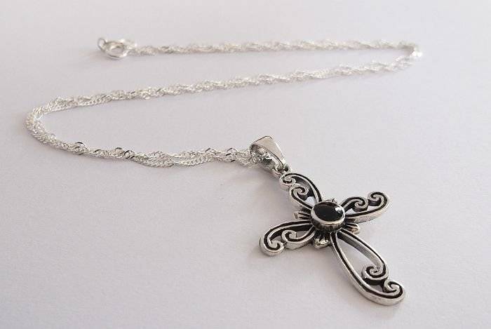 A STERLING SILVER NECKLACE PLUS A STERLING SILVER CROSS PENDANT...ONYX LOOK CENTER