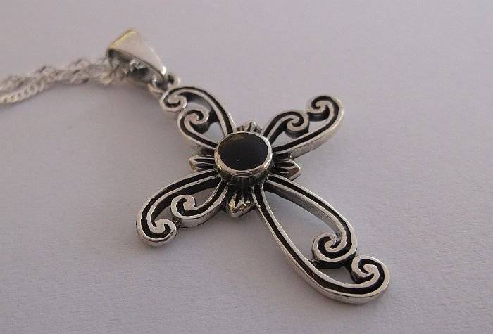 A STERLING SILVER NECKLACE PLUS A STERLING SILVER CROSS PENDANT...ONYX LOOK CENTER