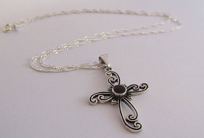 A STERLING SILVER NECKLACE PLUS A STERLING SILVER CROSS PENDANT...ONYX LOOK CENTER