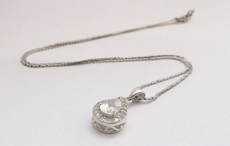 A vintage German silver necklace and a Sterling Silver pendant with a Fancy faceted Pear shape stone