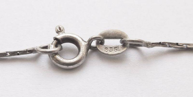 A vintage German silver necklace and a Sterling Silver pendant with a Fancy faceted Pear shape stone