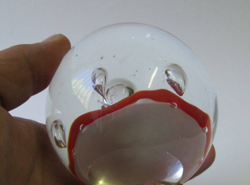 A FABULOUS VINTAGE SOLID GLASS PAPERWEIGHT WITH RED LAVA LOOK DECORATION AND BUBBLES !! WOW !!