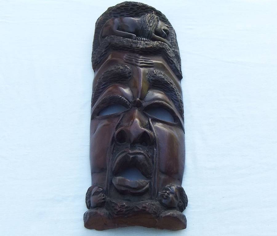 A big and heavy solid carved wood Vintage Traditional African mask with lots of detail !! WoW !
