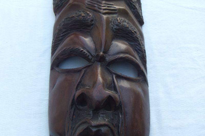 A big and heavy solid carved wood Vintage Traditional African mask with lots of detail !! WoW !