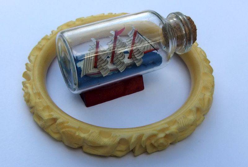 FOR HIM & HER !! A CUTE BOAT IN A BOTTLE AND A VINTAGE CARVED BONE BANGLE !! BID FOR BOTH !!