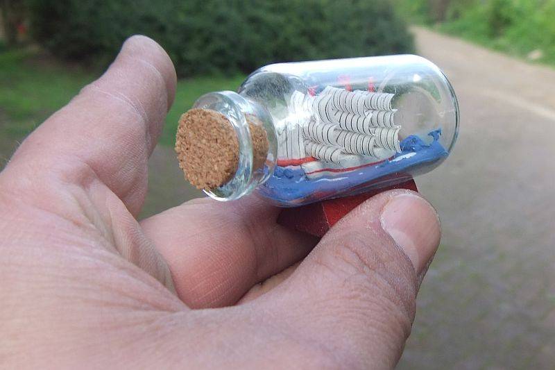 FOR HIM & HER !! A CUTE BOAT IN A BOTTLE AND A VINTAGE CARVED BONE BANGLE !! BID FOR BOTH !!