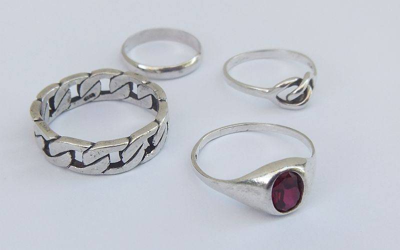 GREAT DEAL !! FOUR DIFFERENT SOLID STERLING SILVER RINGS !! BID FOR THE LOT !! WOW !!