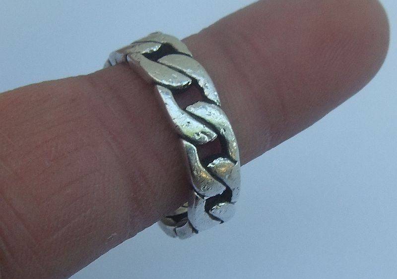 GREAT DEAL !! FOUR DIFFERENT SOLID STERLING SILVER RINGS !! BID FOR THE LOT !! WOW !!