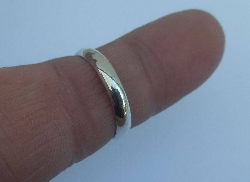 GREAT DEAL !! FOUR DIFFERENT SOLID STERLING SILVER RINGS !! BID FOR THE LOT !! WOW !!