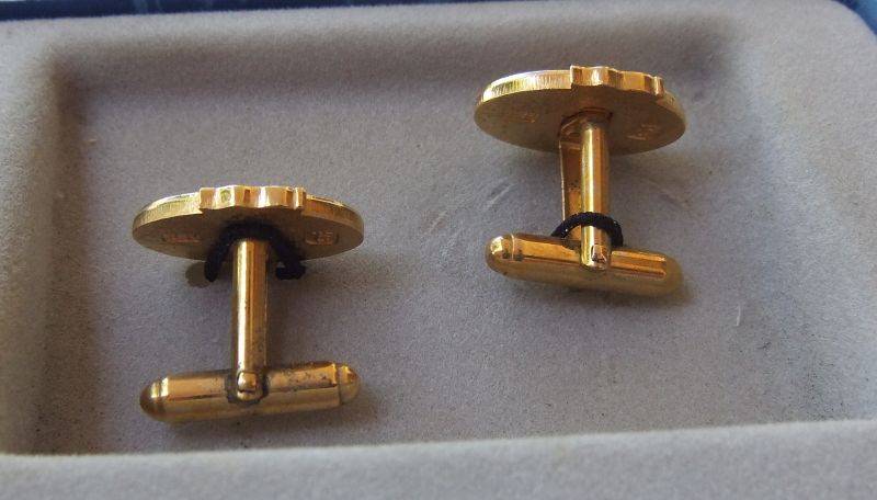 A PAIR OF VINTAGE CUFFLINKS MADE FOR SAFMARINE 50 YEAR ANNIVERSARY