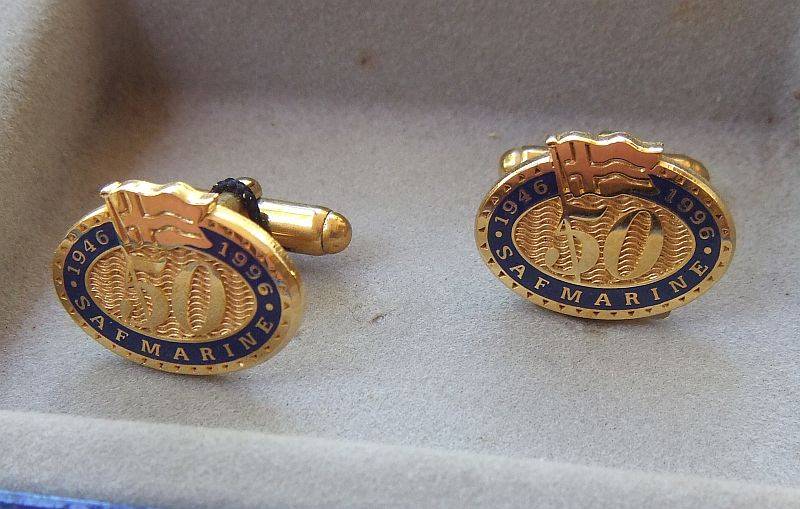 A PAIR OF VINTAGE CUFFLINKS MADE FOR SAFMARINE 50 YEAR ANNIVERSARY