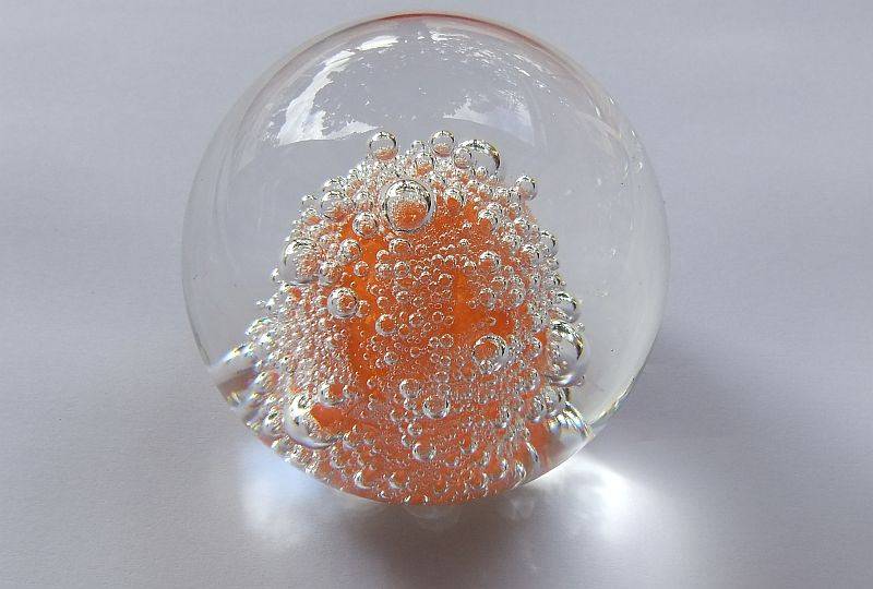 A DAMAGE FREE VINTAGE GENUINE MURANO SOLID GLASS PAPERWEIGHT WITH ORANGE "EXPLOSION " ...LOVE IT !!