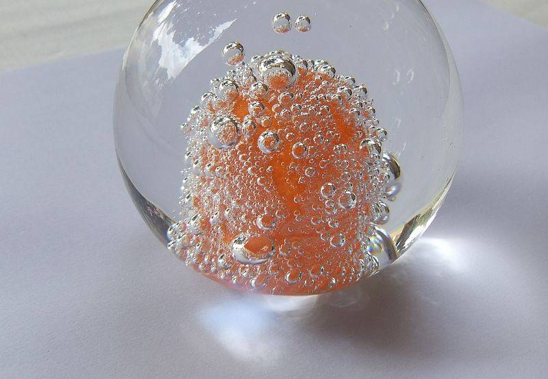 A DAMAGE FREE VINTAGE GENUINE MURANO SOLID GLASS PAPERWEIGHT WITH ORANGE "EXPLOSION " ...LOVE IT !!