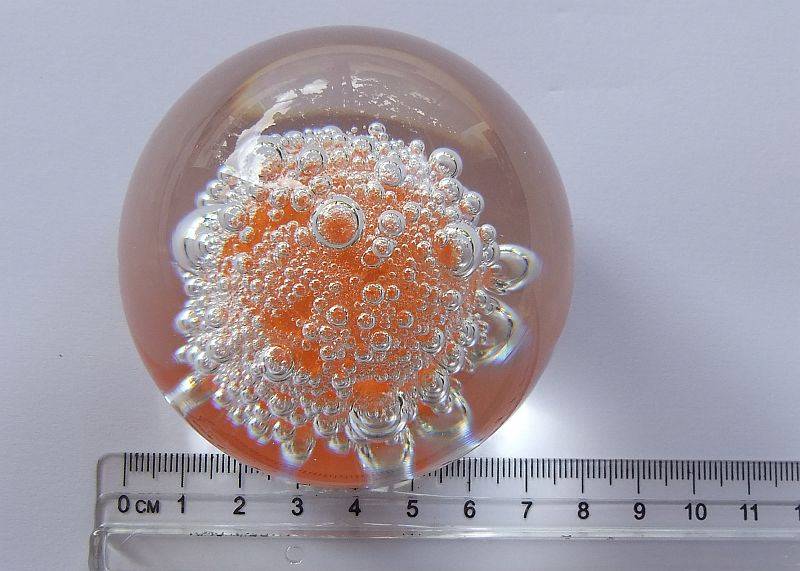 A DAMAGE FREE VINTAGE GENUINE MURANO SOLID GLASS PAPERWEIGHT WITH ORANGE "EXPLOSION " ...LOVE IT !!