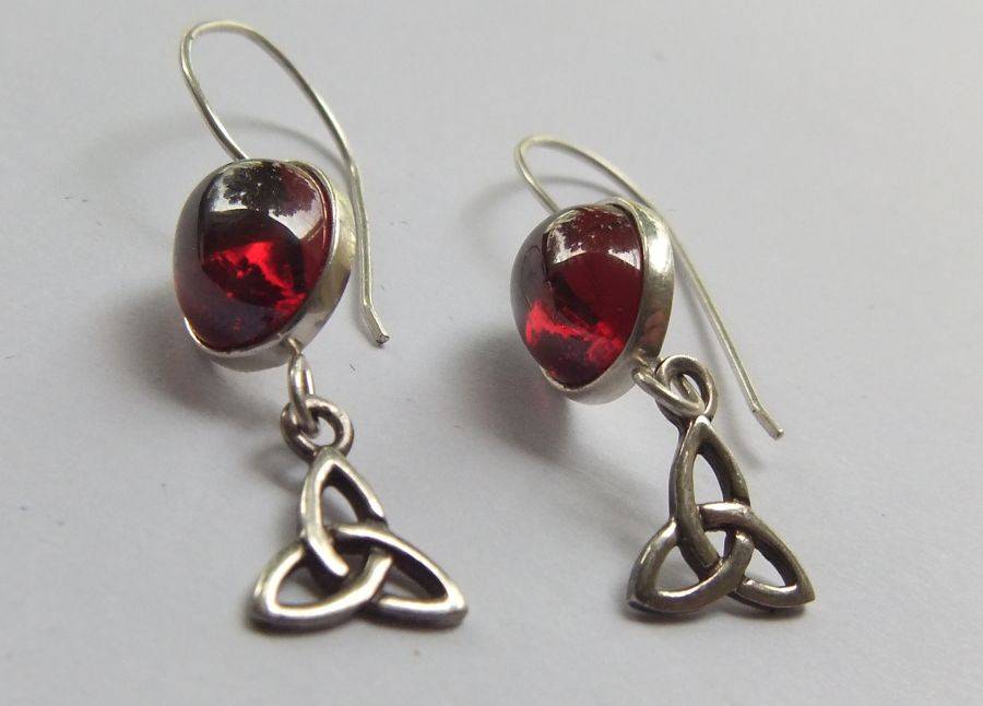 A STERLING SILVER PAIR OF EARRINGS WITH CABOCHON RED STONES AND CELTIC DECORATIONS !! FREE COMBINING