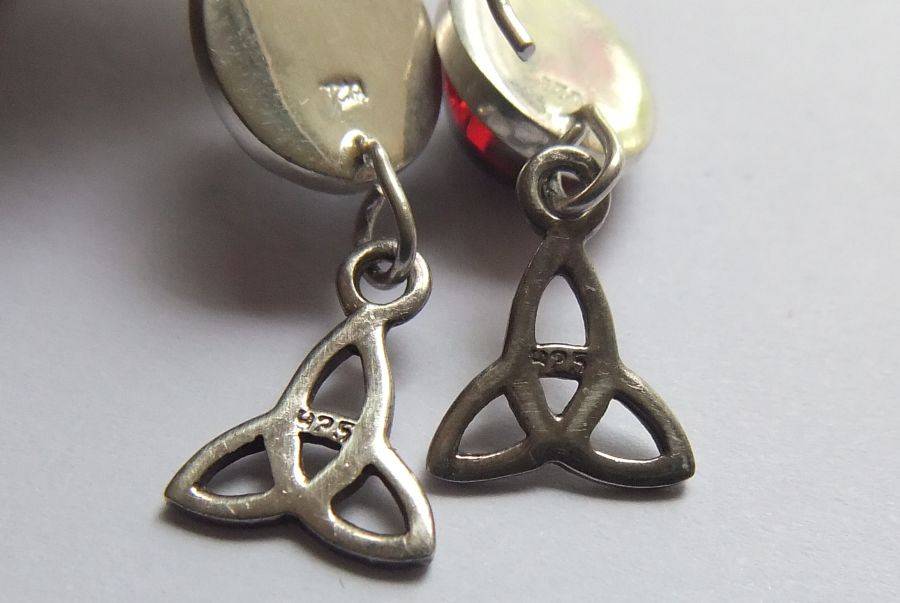 A STERLING SILVER PAIR OF EARRINGS WITH CABOCHON RED STONES AND CELTIC DECORATIONS !! FREE COMBINING