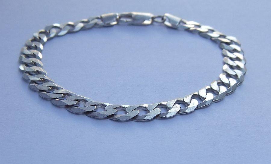 A SUPERIOR QUALITY WIDE WEIGHTY SOLID STERLING SILVER BRACELET WITH COOL CHAIN LINK SYSTEM !! WOW !!