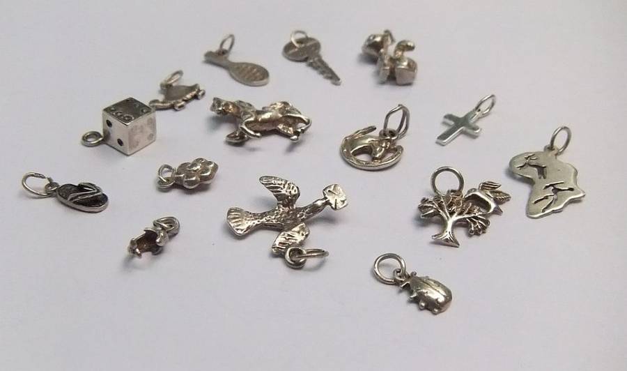 A FABULOUS JOB LOT OF 15 STERLING SILVER CHARMS / PENDANTS !! BID FOR THE LOT !! SCORE !!
