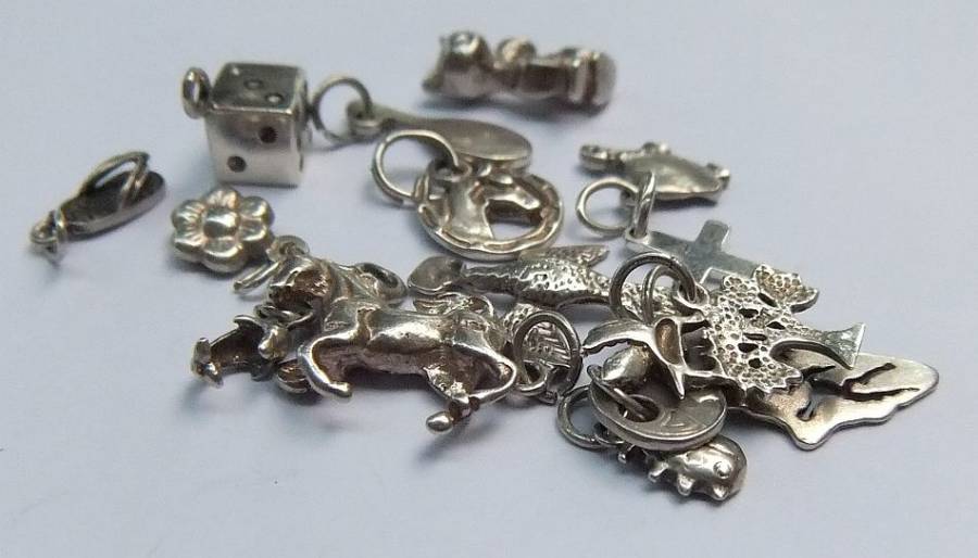 A FABULOUS JOB LOT OF 15 STERLING SILVER CHARMS / PENDANTS !! BID FOR THE LOT !! SCORE !!