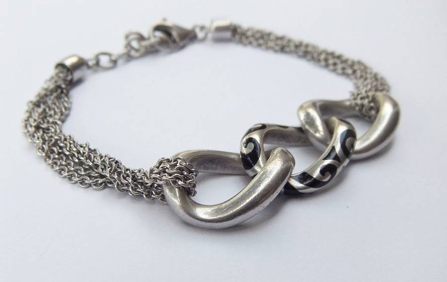 A SUPERIOR QUALITY DESIGNER MULTI STRAND BRACELET BY ESPRIT - STAMPED AND TESTED - HIGH VALUE