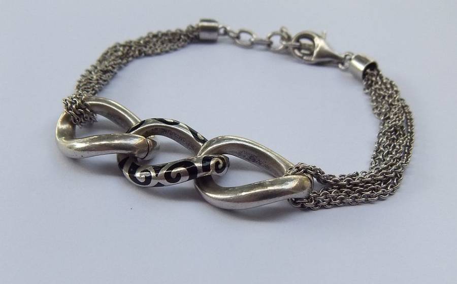A SUPERIOR QUALITY DESIGNER MULTI STRAND BRACELET BY ESPRIT - STAMPED AND TESTED - HIGH VALUE