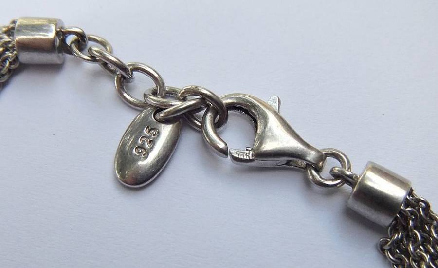 A SUPERIOR QUALITY DESIGNER MULTI STRAND BRACELET BY ESPRIT - STAMPED AND TESTED - HIGH VALUE