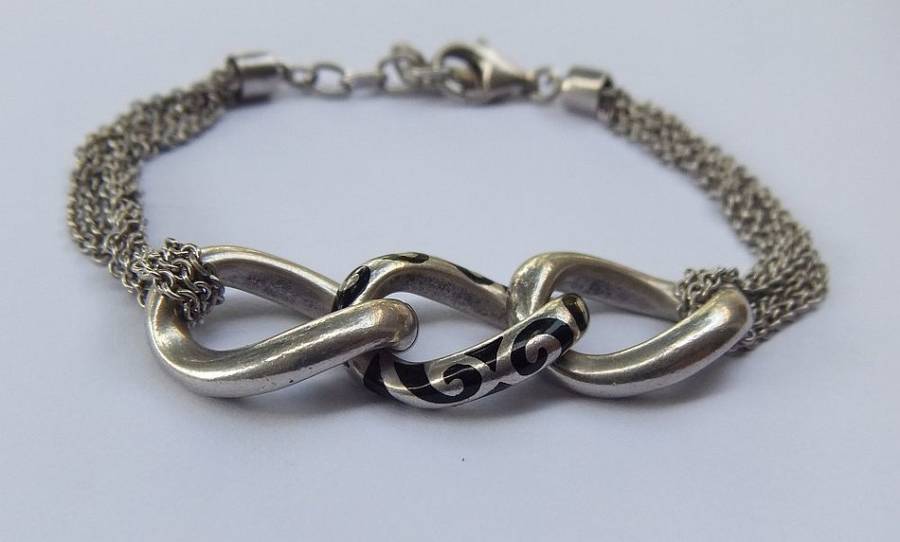 A SUPERIOR QUALITY DESIGNER MULTI STRAND BRACELET BY ESPRIT - STAMPED AND TESTED - HIGH VALUE