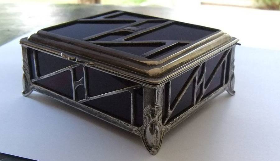 A BEAUTIFUL ART DECO PERIOD METAL AND GLASS JEWELRY BOX