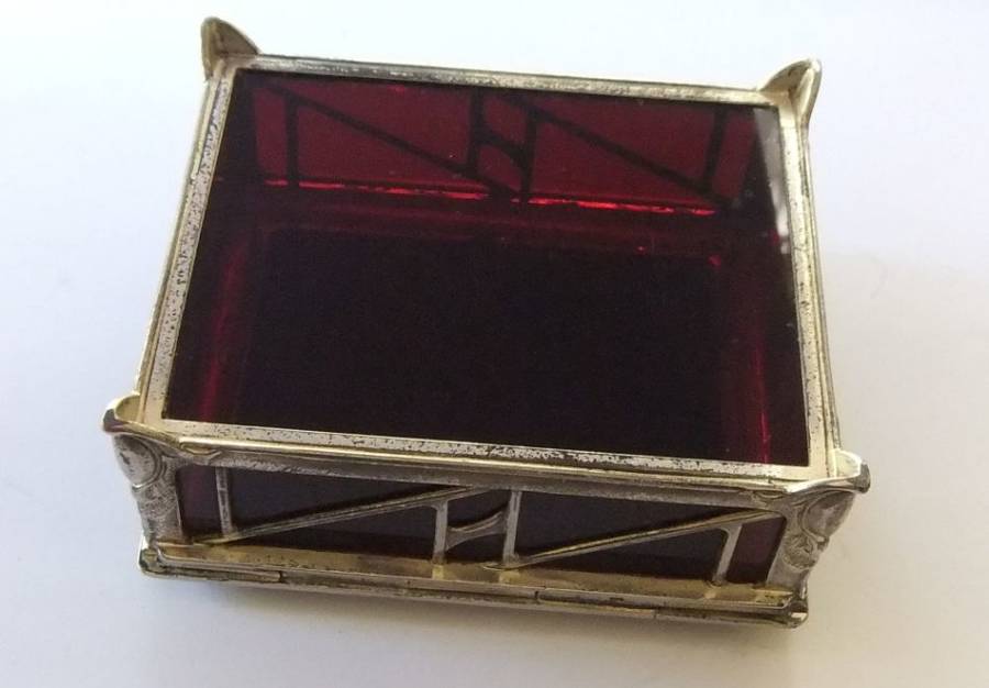 A BEAUTIFUL ART DECO PERIOD METAL AND GLASS JEWELRY BOX