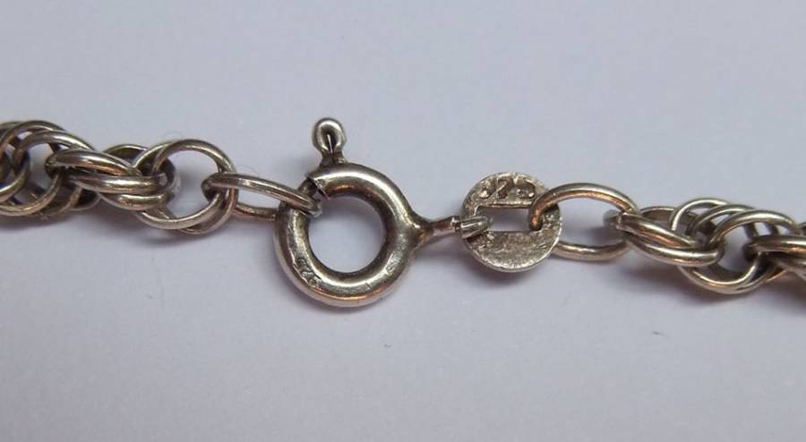 A STUPENDOUS SOLID STERLING SILVER JEWEL ENCRUSTED CROSS PENDANT WITH VINTAGE MULTI LINK NECKLACE