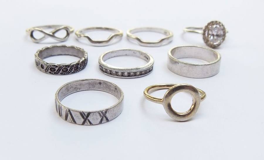 OH BOY !! WHAT A TREAT !! NINE SOLID STERLING SILVER RINGS FOR YOUR COLLECTION !! BID FOR THE LOT !!