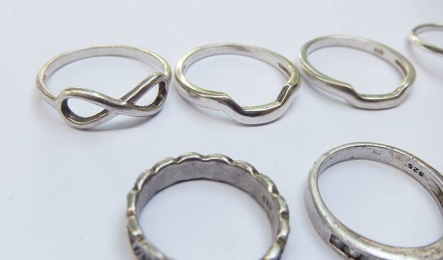OH BOY !! WHAT A TREAT !! NINE SOLID STERLING SILVER RINGS FOR YOUR COLLECTION !! BID FOR THE LOT !!