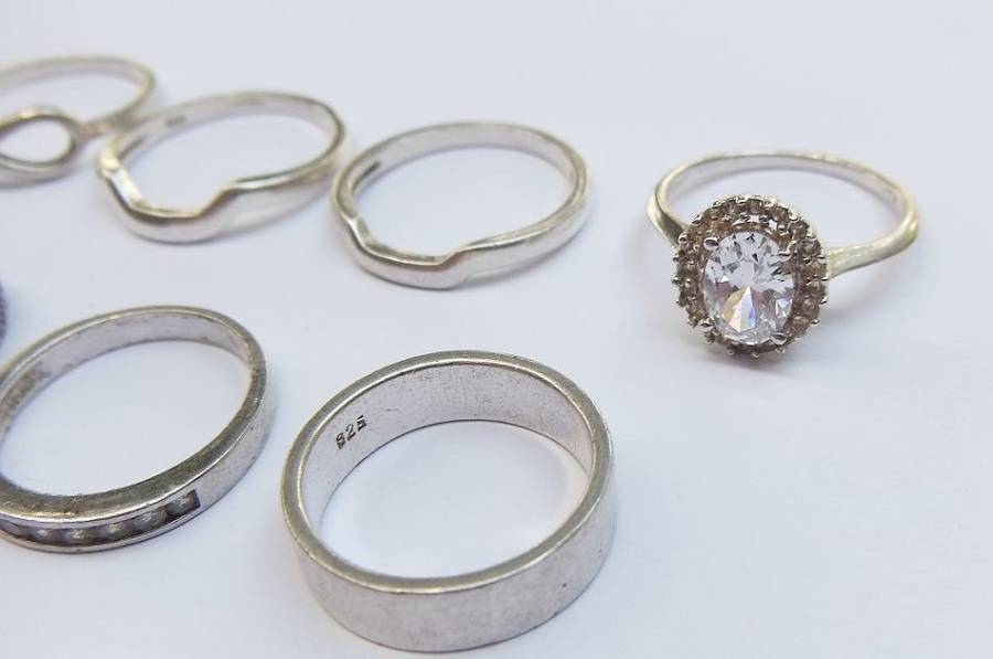 OH BOY !! WHAT A TREAT !! NINE SOLID STERLING SILVER RINGS FOR YOUR COLLECTION !! BID FOR THE LOT !!