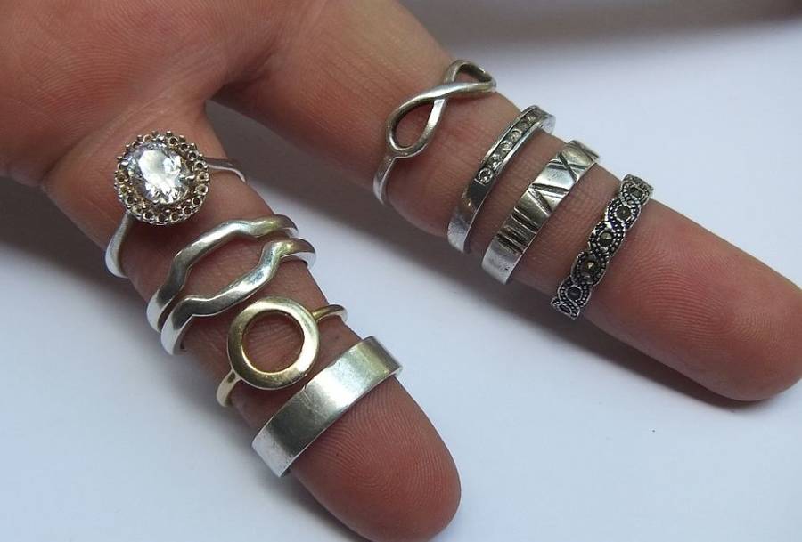 OH BOY !! WHAT A TREAT !! NINE SOLID STERLING SILVER RINGS FOR YOUR COLLECTION !! BID FOR THE LOT !!