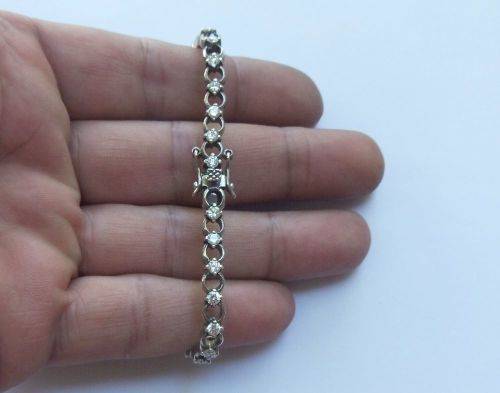 A CLASSY VINTAGE LOOK SOLID STERLING SILVER BRACELET WITH SAFETY CLASP AND FACETED STONES !! LOOK !!