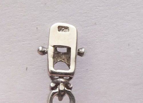 A CLASSY VINTAGE LOOK SOLID STERLING SILVER BRACELET WITH SAFETY CLASP AND FACETED STONES !! LOOK !!