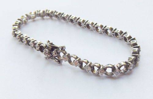 A CLASSY VINTAGE LOOK SOLID STERLING SILVER BRACELET WITH SAFETY CLASP AND FACETED STONES !! LOOK !!