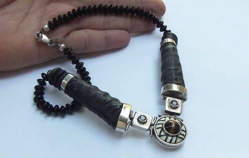 A ONE OF A KIND BUCK HORN , BONE , TIGERS EYE , BLACK STONE AND STERLING SILVER NECKLACE !!
