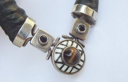 A ONE OF A KIND BUCK HORN , BONE , TIGERS EYE , BLACK STONE AND STERLING SILVER NECKLACE !!