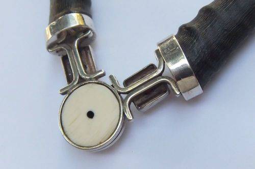 A ONE OF A KIND BUCK HORN , BONE , TIGERS EYE , BLACK STONE AND STERLING SILVER NECKLACE !!