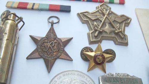 A COOL JOBLOT OF COLLECTABLES !! AFRICANA !! MILITARIA !! LIGHTERS !! MEDALLIONS !! BID FOR THE LOT