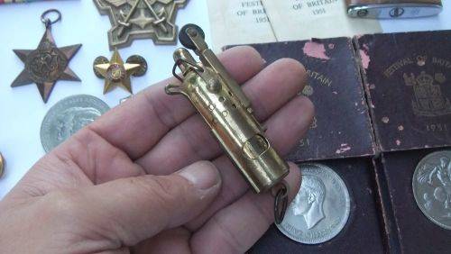 A COOL JOBLOT OF COLLECTABLES !! AFRICANA !! MILITARIA !! LIGHTERS !! MEDALLIONS !! BID FOR THE LOT