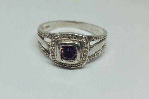 KYK !! A LOVELY SOLID STERLING SILVER RING SET WITH A SINGLE FACETED PURPLE STONE !! FULLY TESTED !!