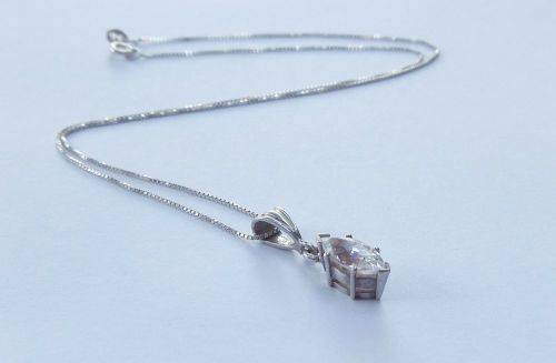AN ELEGANT STERLING SILVER PENDANT SET WITH A MARQUISE CUT STONE PLUS A STERLING SILVER NECKLACE !!