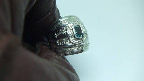 AN EXCEPTIONAL WIDE SOLID STERLING SILVER RING SET WITH A FACETED BLUE STONE IN GREAT CONDITION !!