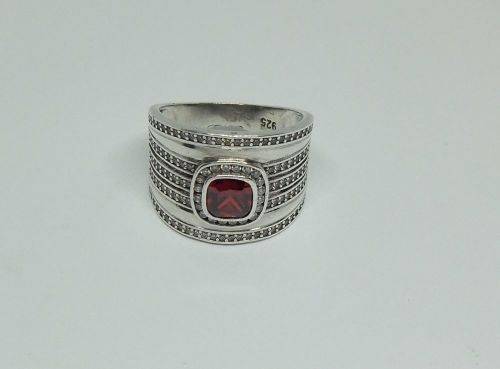 AN AMAZING WIDE SOLID STERLING SILVER RING SET WITH LOTS OF FACETED STONES !! MUST SEE , MUST HAVE !