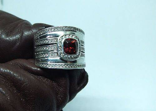 AN AMAZING WIDE SOLID STERLING SILVER RING SET WITH LOTS OF FACETED STONES !! MUST SEE , MUST HAVE !