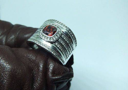 AN AMAZING WIDE SOLID STERLING SILVER RING SET WITH LOTS OF FACETED STONES !! MUST SEE , MUST HAVE !