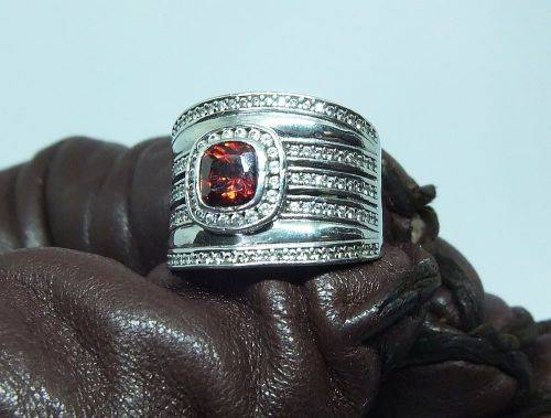 AN AMAZING WIDE SOLID STERLING SILVER RING SET WITH LOTS OF FACETED STONES !! MUST SEE , MUST HAVE !